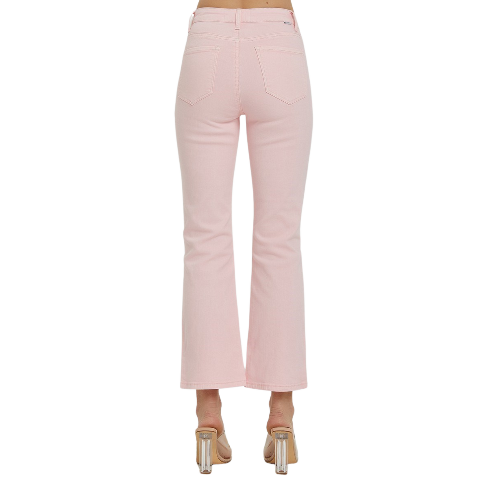 These Mid Rise Straight Jeans in a soft pink color from the Risen brand offer a comfortable mid rise fit and a classic straight leg design. Perfect for everyday wear, these jeans provide a flattering silhouette and stylish versatility.