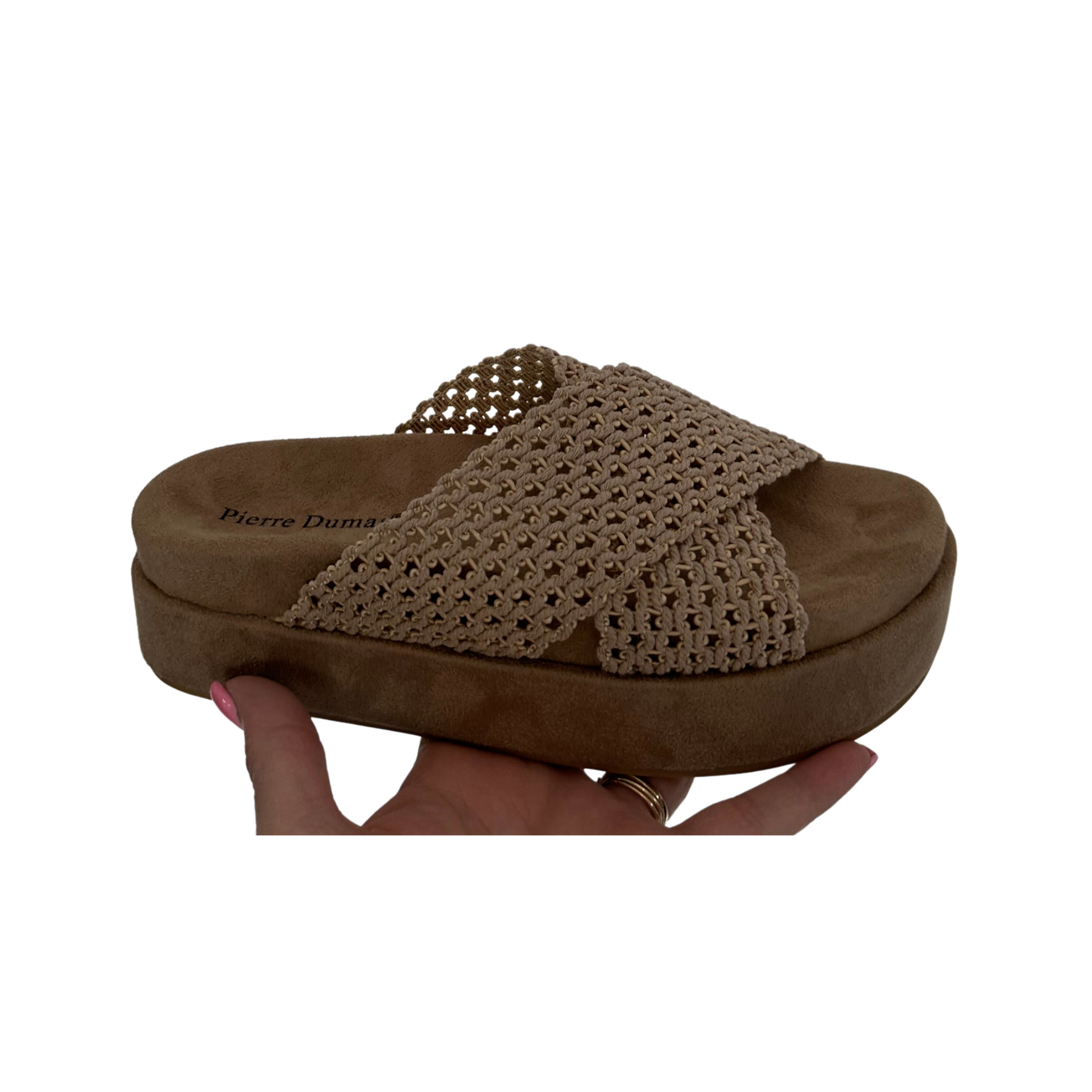 The Mind sandal from Pierre Dumas combines understated elegance with everyday comfort. Crafted in a sophisticated taupe tone, this versatile style transitions seamlessly from casual outings to relaxed social gatherings. The neutral palette pairs effortlessly with any wardrobe, while the thoughtful design ensures all-day wearability. A refined choice for those who value both style and practicality.