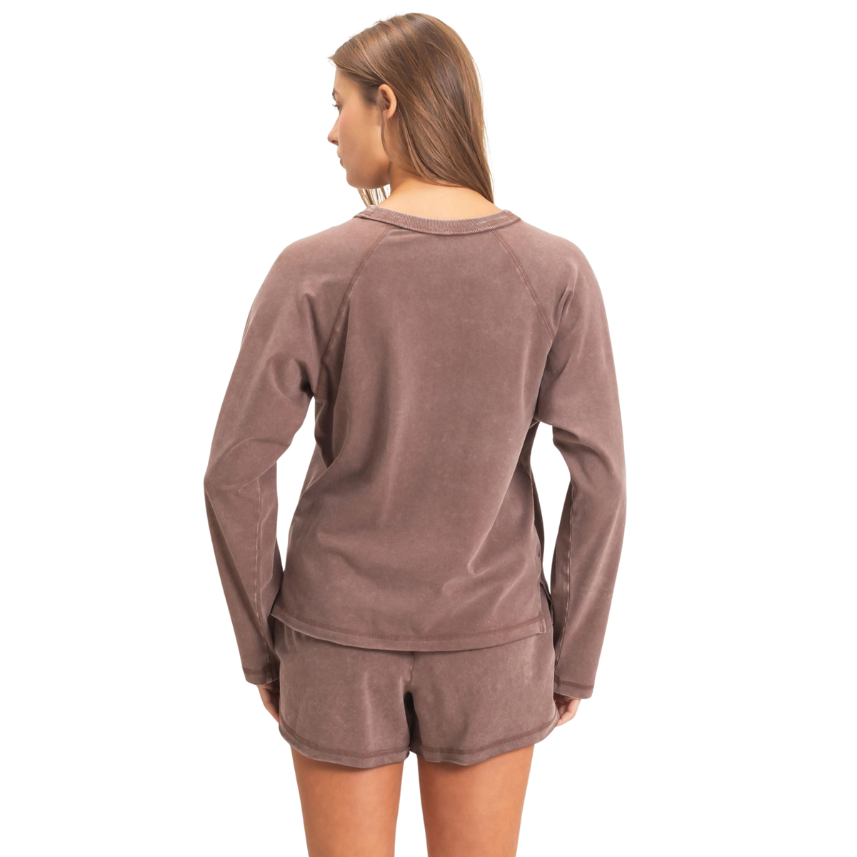 Effortless style meets comfort in this HYFVE mineral washed top and bottom set. The dark brown hue complements any complexion, while the long sleeve top and coordinating shorts create a cohesive, put-together look. Perfect for casual outings, workouts, or relaxing at home. The mineral wash adds a contemporary touch that pairs seamlessly with sneakers or slides.