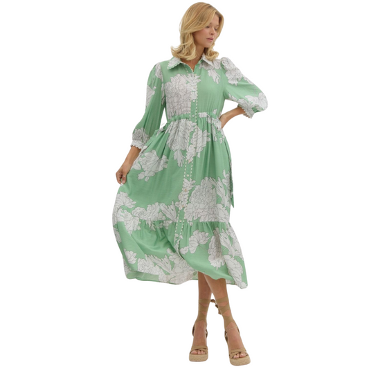 This mint green midi dress from Entro boasts a timeless style with a collared neckline and button-up front. The delicate floral print adds a touch of femininity. Made from high-quality materials, this dress is perfect for any occasion.