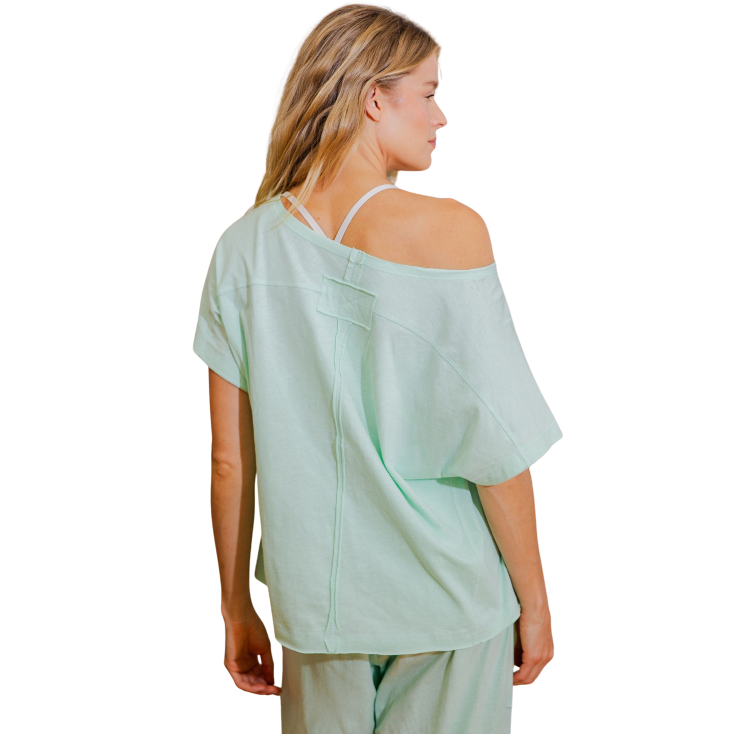 Effortless style meets comfort in this Cotton Slub Off-The-Shoulder Tee by Rae Mode. The soft, textured cotton slub fabric drapes beautifully, while the one-shoulder design adds a modern, flattering touch. In a soothing mint color, this versatile piece transitions seamlessly from casual days to evening outings. Perfect for layering or wearing solo, it's a wardrobe essential that combines contemporary flair with everyday wearability.