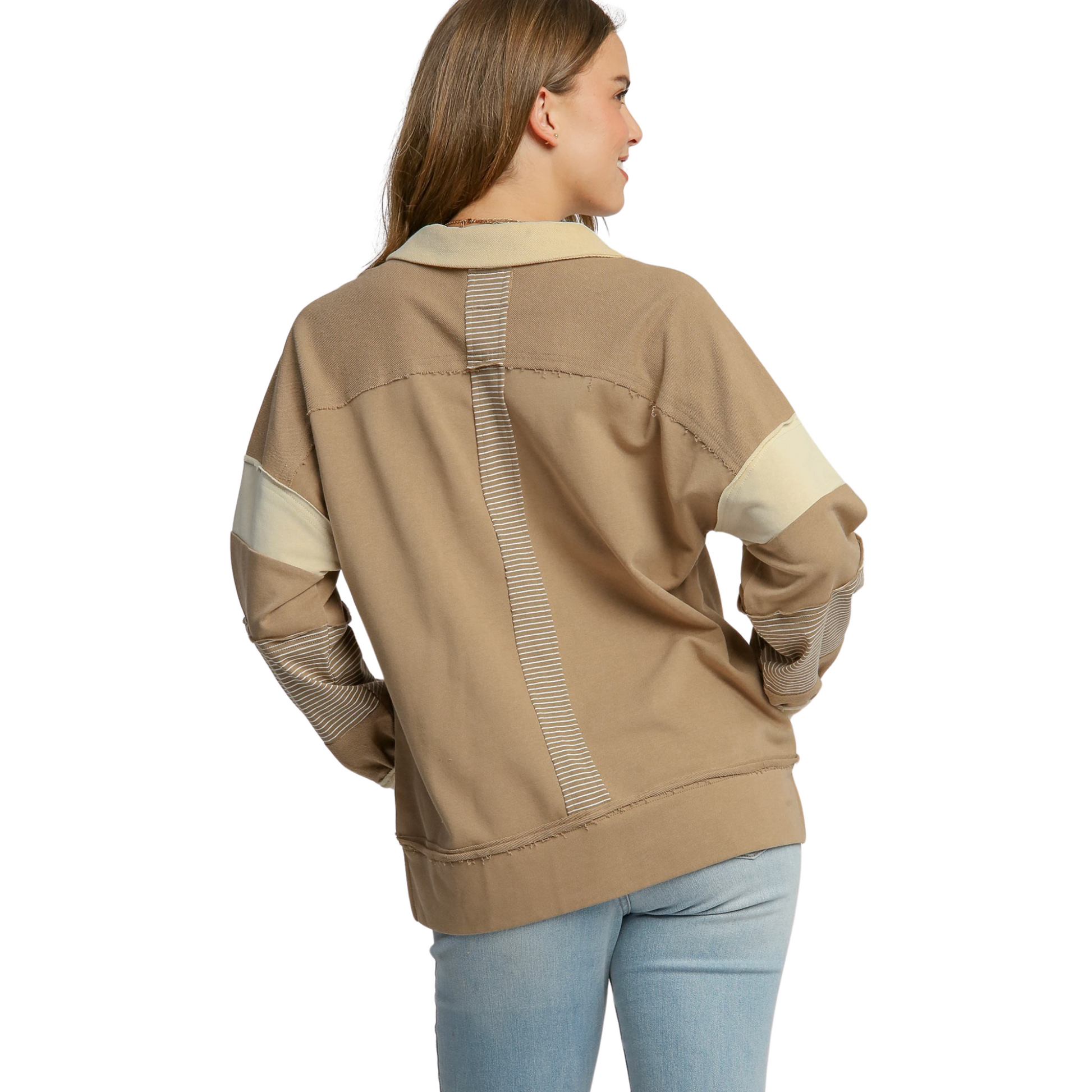 This Umgee brand French Terry Long Sleeve Top in mocha color features a mixed media design and pullover style. Its versatile and comfortable design will elevate your wardrobe while providing a polished look.