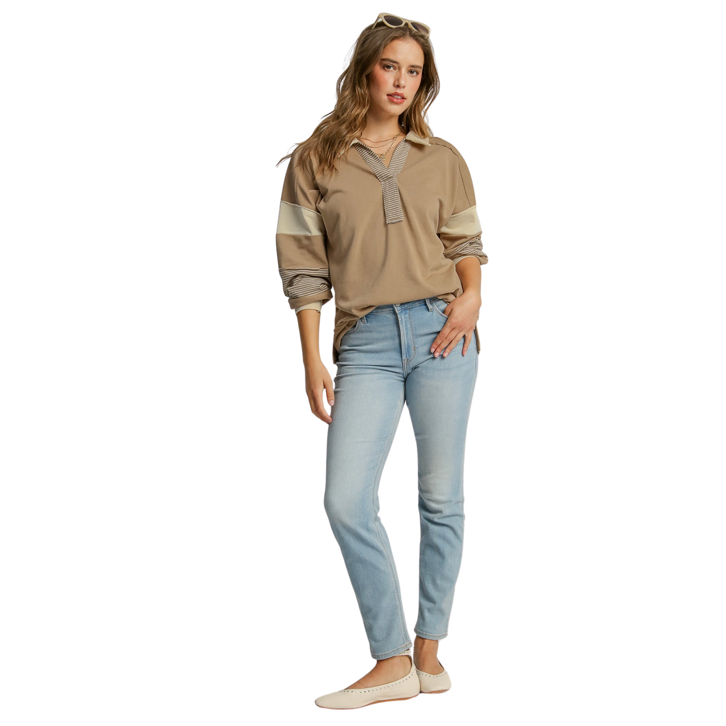 This Umgee brand French Terry Long Sleeve Top in mocha color features a mixed media design and pullover style. Its versatile and comfortable design will elevate your wardrobe while providing a polished look.