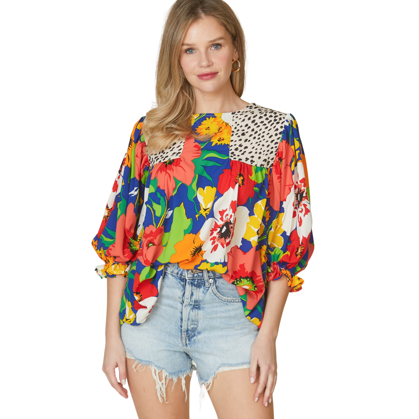 Elevate your wardrobe with this vibrant Mix Match Patterned Top from Beeson River. Featuring a bold combination of floral and animal prints, this piece brings playful energy to any outfit. The flattering 3/4 length sleeves offer the perfect balance of coverage and style, ideal for layering or wearing solo. Rich, eye-catching colors make this top a versatile statement piece that transitions seamlessly from casual days to weekend adventures. Perfect for those who love to express their unique style.