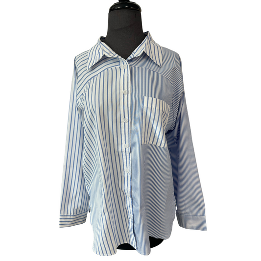 Experience both style and versatility with our Mix Print Button Up Top. This top features a bold blue and white stripe design, along with a mix print that adds a unique touch. The collared neckline and button up front offer a polished look, while the pocket adds functionality. Elevate your wardrobe with this must-have top.