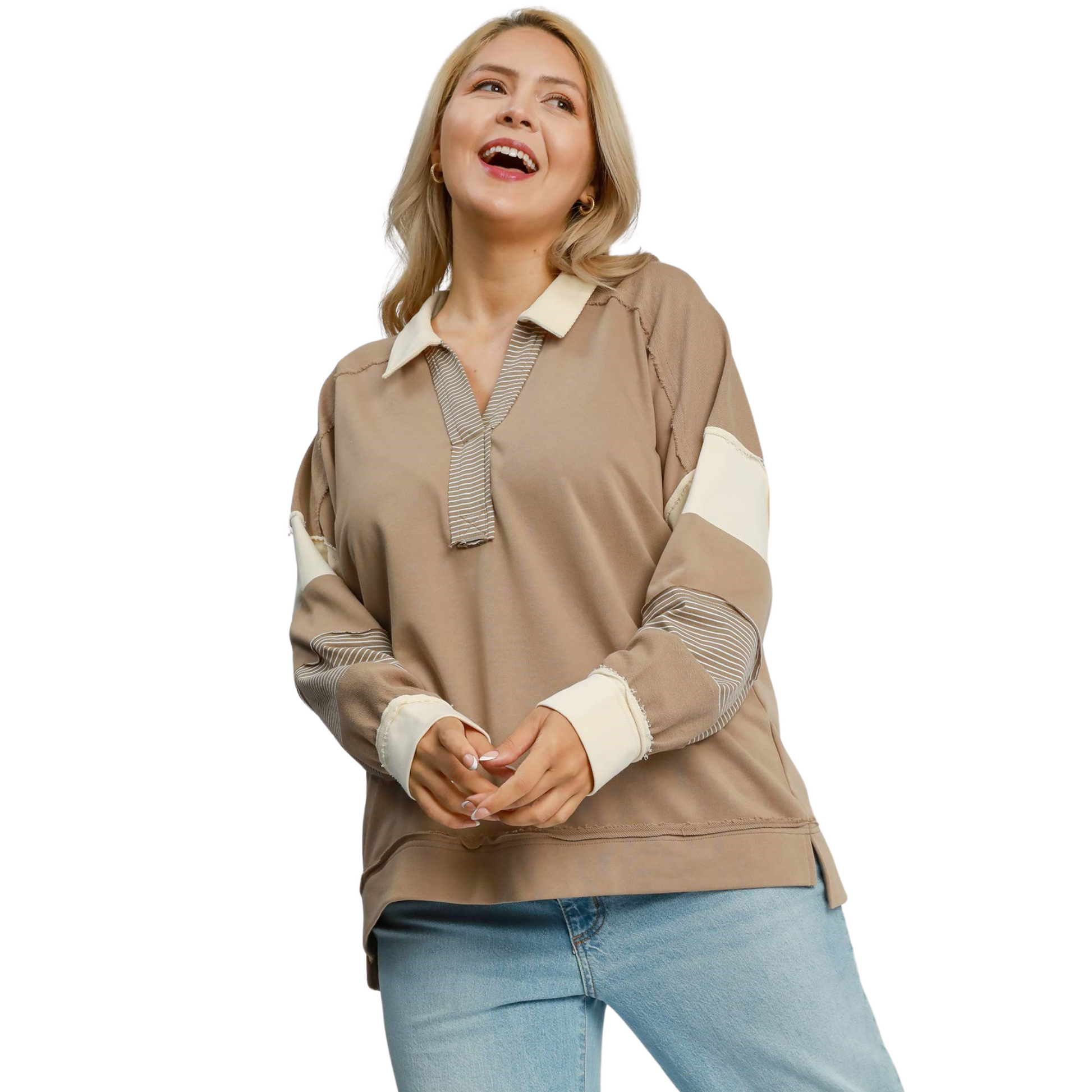 This Umgee brand French Terry Color Block Top in mocha is perfect for any plus size individual. Its mixed media design adds a touch of style while still providing ultimate comfort. A must-have addition to any wardrobe.