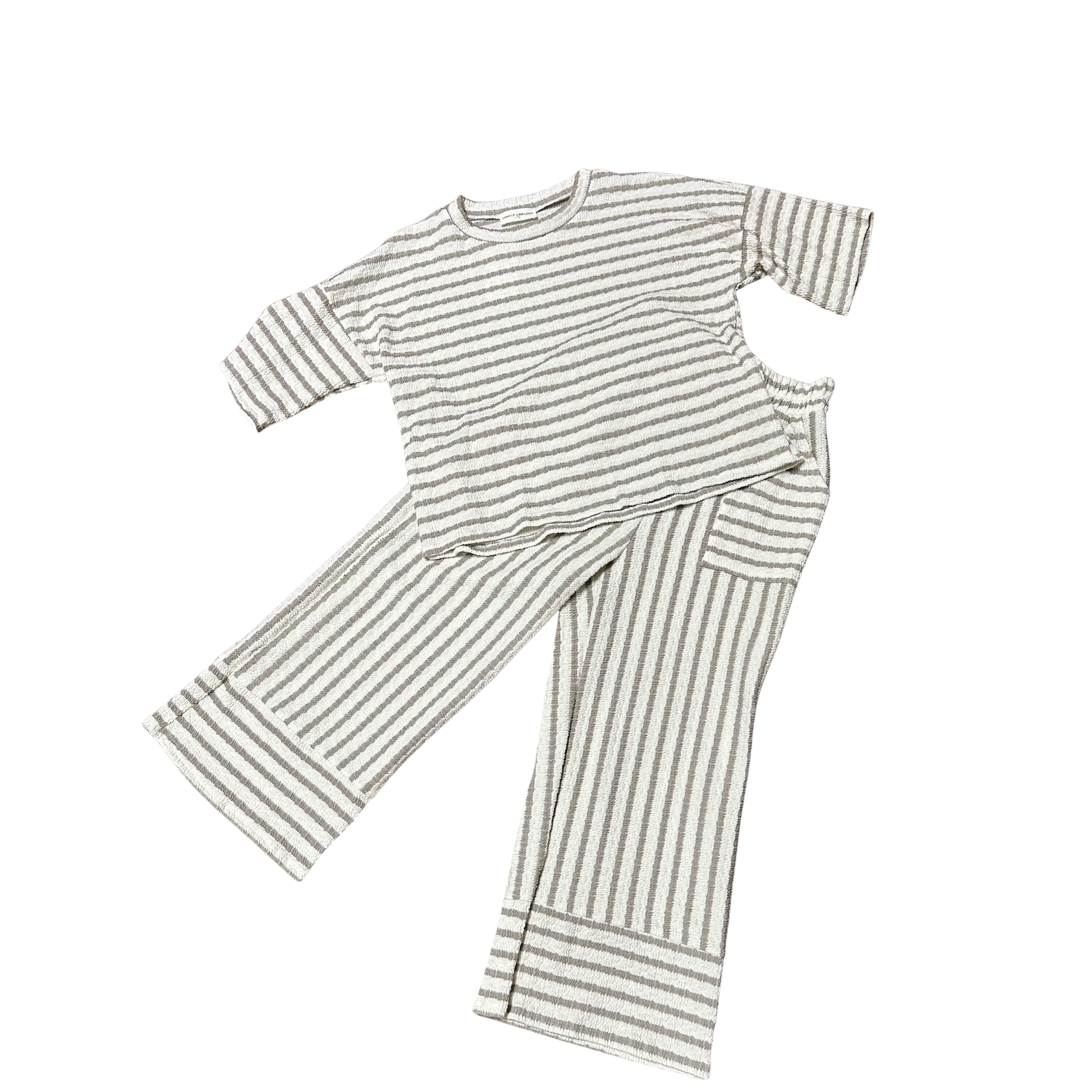Mocha and cream striped short sleeve top paired with matching pants. This coordinated set from Lovely Melody offers effortless style with its classic color palette and timeless stripe pattern. Perfect for casual everyday wear or relaxed outings. The comfortable fit makes it ideal for all-day comfort.