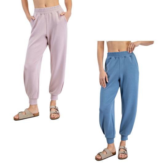 These full-length jogger pants from Rae Mode combine comfort and style with their soft modal fabric and modern scuba finish. Available in Mauve or Paradise Blue, they provide a flattering fit perfect for casual wear or active days. Durable and versatile, these joggers are an essential addition to any wardrobe seeking both function and fashion.