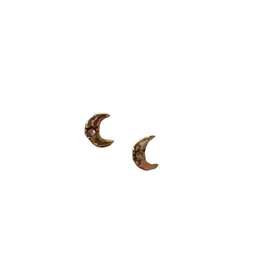Crafted with a delicate gold finish, these Tiny Moon Studs feature a rhinestone accent and a tiny moon shape. Perfect for any occasion, these studs add a touch of elegance to your outfit. Show off your celestial style with these stunning studs.