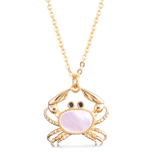 This elegant necklace features a beautiful crab design made of gold and embellished with mother of pearl and sparkling rhinestones. The pink color adds a touch of femininity to this piece, making it a perfect accessory for any occasion. Embrace the beauty and uniqueness of nature with this one-of-a-kind Mother of Pearl Crab Necklace.