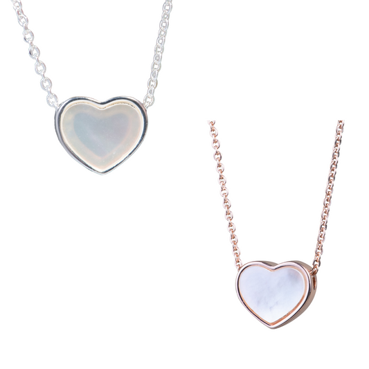 This elegant necklace features a heart-shaped pendant made of shimmering mother of pearl. Available in both silver and rose gold, it adds a touch of sophistication to any outfit. Perfect for any occasion, it makes a thoughtful and timeless gift for a loved one or yourself.