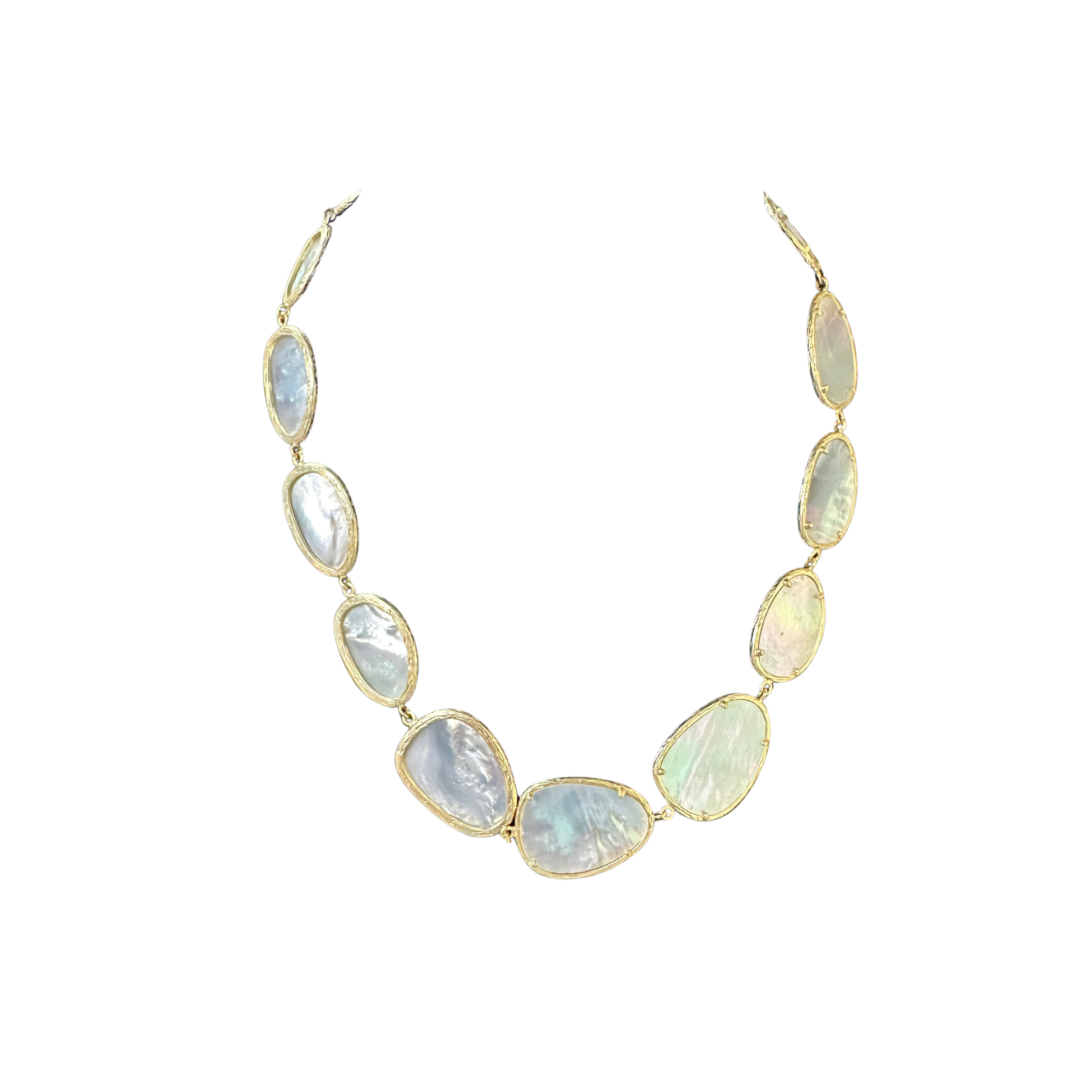 Elegant short necklace featuring a lustrous mother of pearl accent. The iridescent shell element catches light beautifully, adding a sophisticated touch to any outfit. Perfect for layering or wearing alone, this piece combines timeless style with natural beauty. Gold-toned hardware complements the pearl's soft shimmer for a refined, versatile look.
