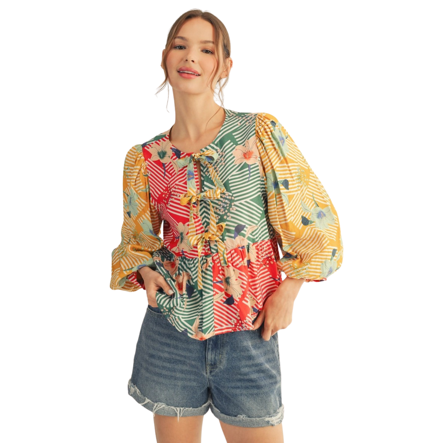 Elevate your wardrobe with this stunning Jodifl Bow Tie Color Block Top, designed for the modern woman who embraces bold style. Featuring a vibrant mixed media print with striking color blocking, this long sleeve blouse makes an instant statement. The charming bow accent at the neckline adds feminine sophistication and visual interest. Crafted in plus size to ensure a comfortable, flattering fit for all body types. 