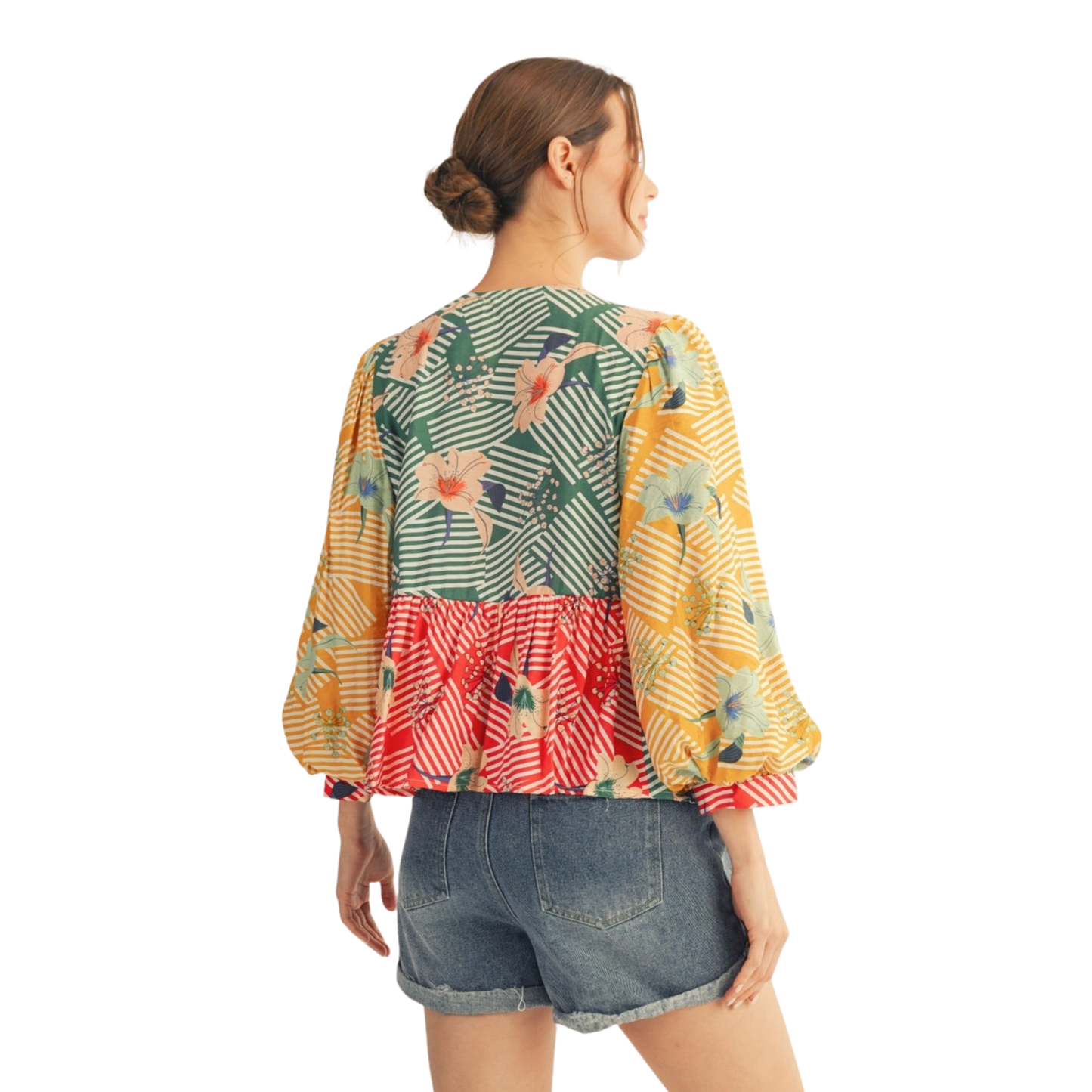 Elevate your wardrobe with this stunning Jodifl Bow Tie Color Block Top, designed for the modern woman who embraces bold style. Featuring a vibrant mixed media print with striking color blocking, this long sleeve blouse makes an instant statement. The charming bow accent at the neckline adds feminine sophistication and visual interest. Crafted in plus size to ensure a comfortable, flattering fit for all body types. 