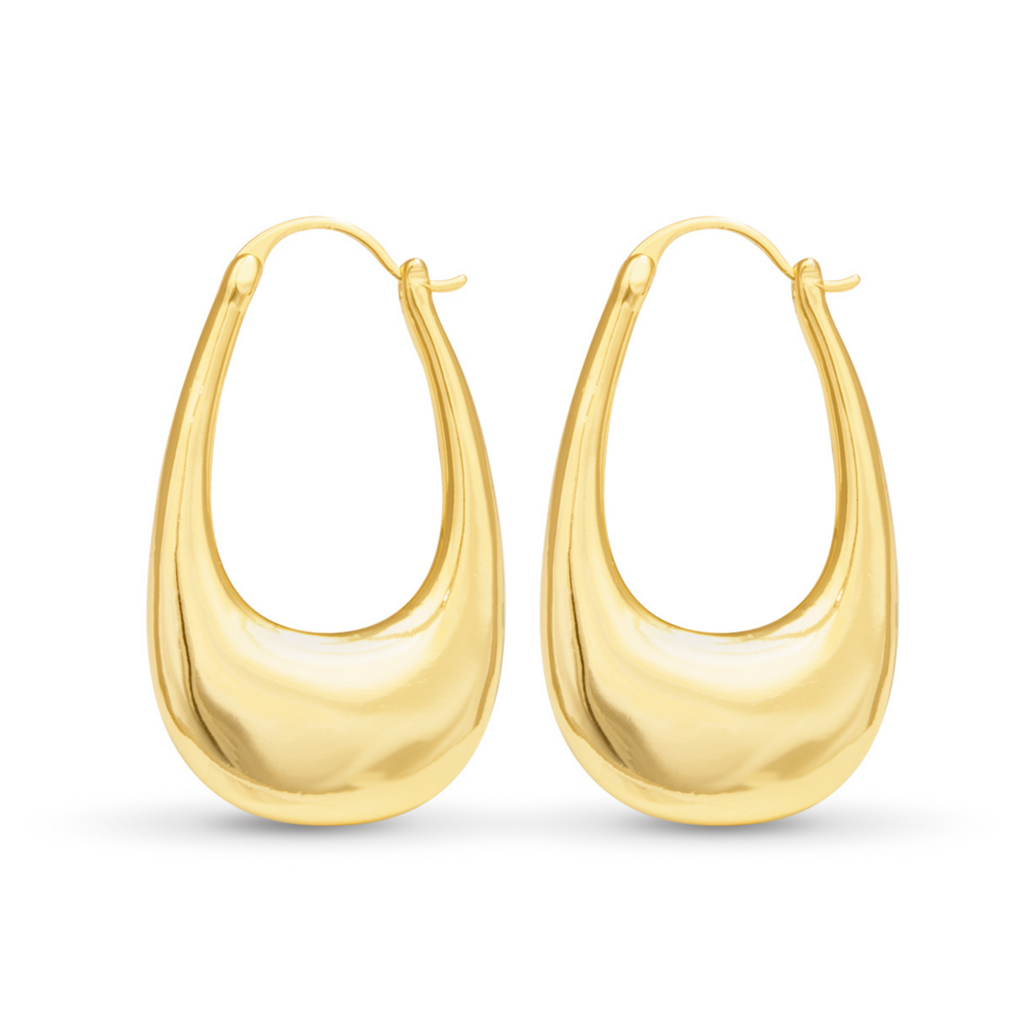 Expertly crafted by Amanda Blu, these Naomi Elongated Hoops are a must-have for any jewelry collection. Made of polished gold, the oval hoops add a touch of sophistication and elegance to any outfit. Elevate your style with these stunning and versatile earrings.