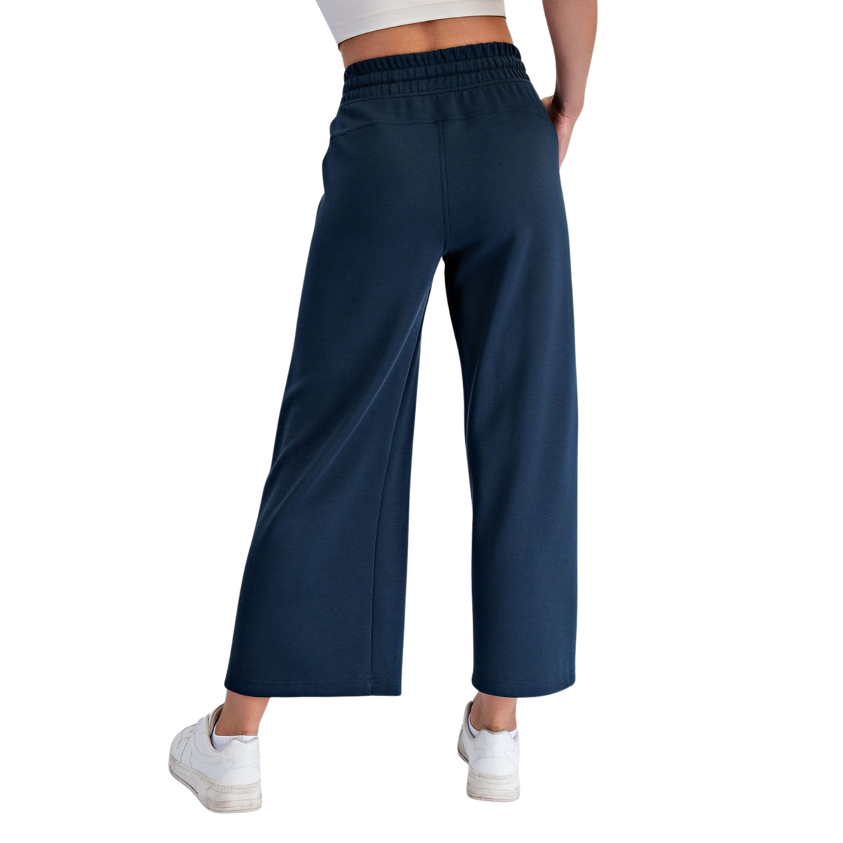 Elevate your casual wardrobe with these Modal Scuba Wide Leg Pants from Rae Mode. Crafted in navy with a comfortable elastic waist, they offer effortless style and all-day comfort. The relaxed wide-leg silhouette provides a flattering fit perfect for lounging or running errands. Lightweight modal fabric moves with you while maintaining its shape. A versatile staple that pairs easily with any top.