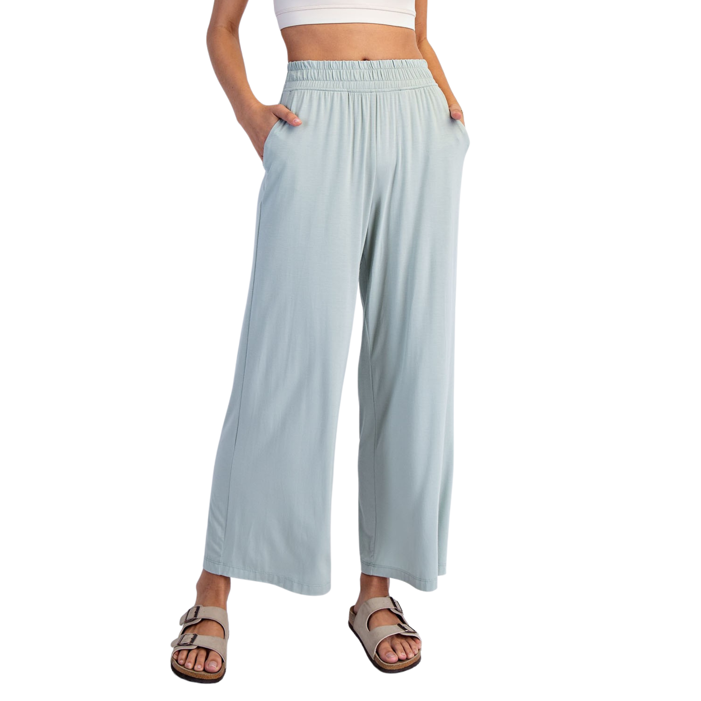 Effortless comfort meets contemporary style with these Rae Mode viscose modal wide leg pants. Crafted in a luxurious moss green hue, these pants feature a relaxed wide leg silhouette that flatters every frame. The elastic waist provides all-day comfort and ease of movement, making them perfect for casual outings or relaxed workdays. The soft, breathable viscose modal fabric drapes beautifully while maintaining its shape. A versatile wardrobe essential that transitions seamlessly from day to night.