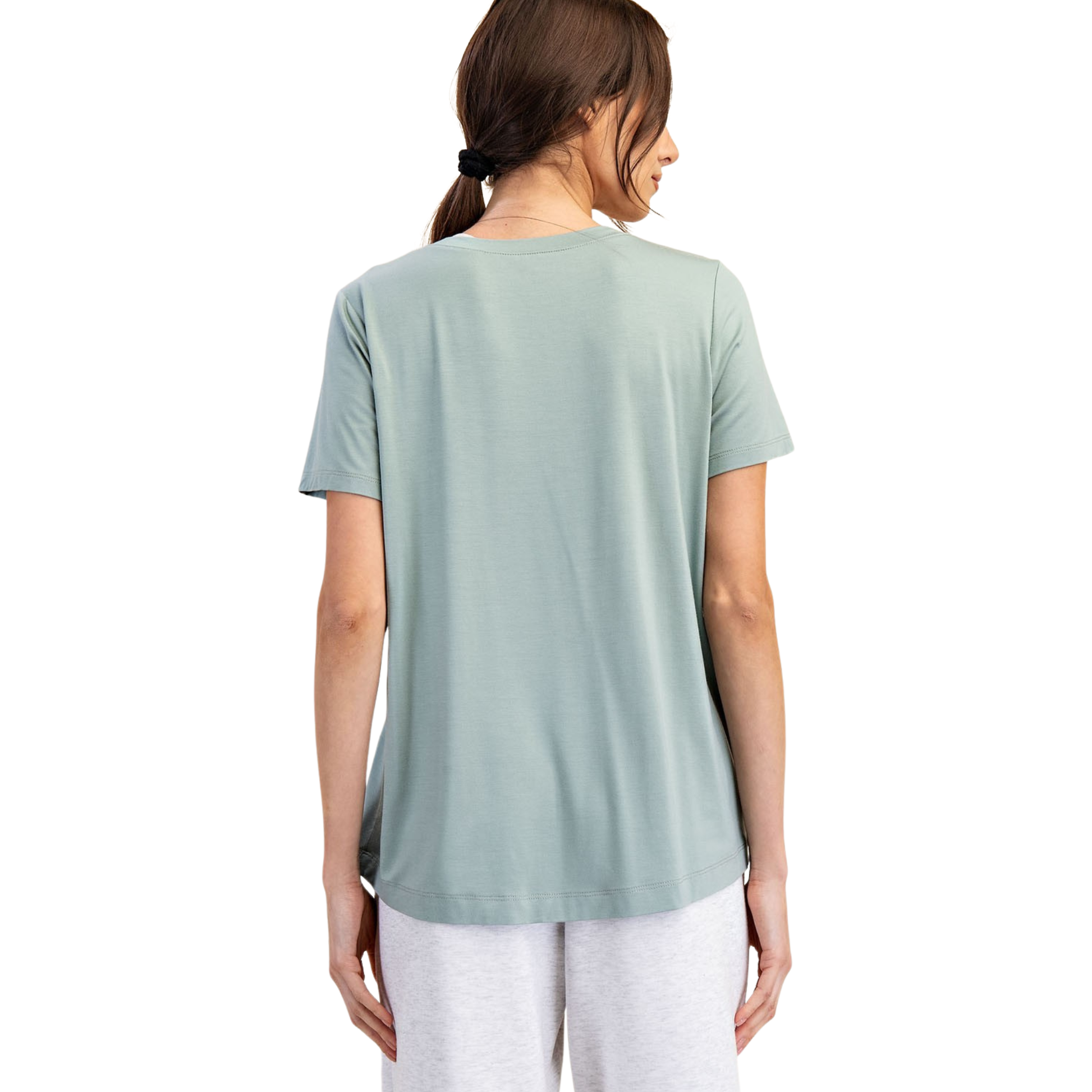 Effortless comfort meets timeless style with this Rae Mode viscose modal short sleeve top. Crafted from soft, breathable fabric, this loose-fitting design drapes beautifully while allowing natural movement. The calming moss color adds a versatile neutral to any wardrobe. Perfect for layering or wearing solo, this plus-size top transitions seamlessly from casual days to relaxed evenings. The smooth modal blend feels luxurious against skin while maintaining easy care.