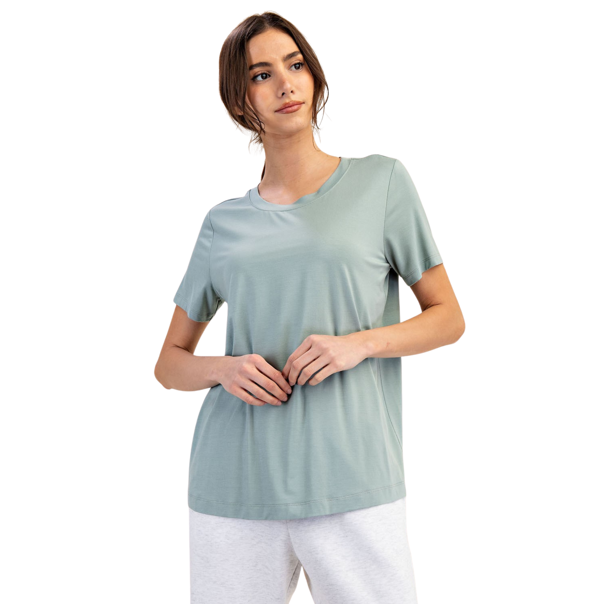 Effortless comfort meets timeless style with this Rae Mode viscose modal short sleeve top. Crafted from soft, breathable fabric, this loose-fitting design drapes beautifully while allowing natural movement. The calming moss color adds a versatile neutral to any wardrobe. Perfect for layering or wearing solo, this plus-size top transitions seamlessly from casual days to relaxed evenings. The smooth modal blend feels luxurious against skin while maintaining easy care.