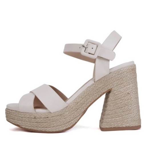 Noble features a stylish open toe wedge design. Its bone-colored upper is crafted from high-grade materials and features a woven bottom for added texture and subtle sophistication, making it the perfect dressy shoe for any occasion.