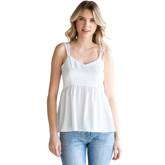 Experience luxurious comfort and style with our Satin Babydoll Camisole. Crafted from high-quality satin, this cami top features adjustable straps for a perfect fit and back smocked detail for added elegance. In a soft off-white color, it's the perfect addition to your wardrobe for a touch of sophistication.