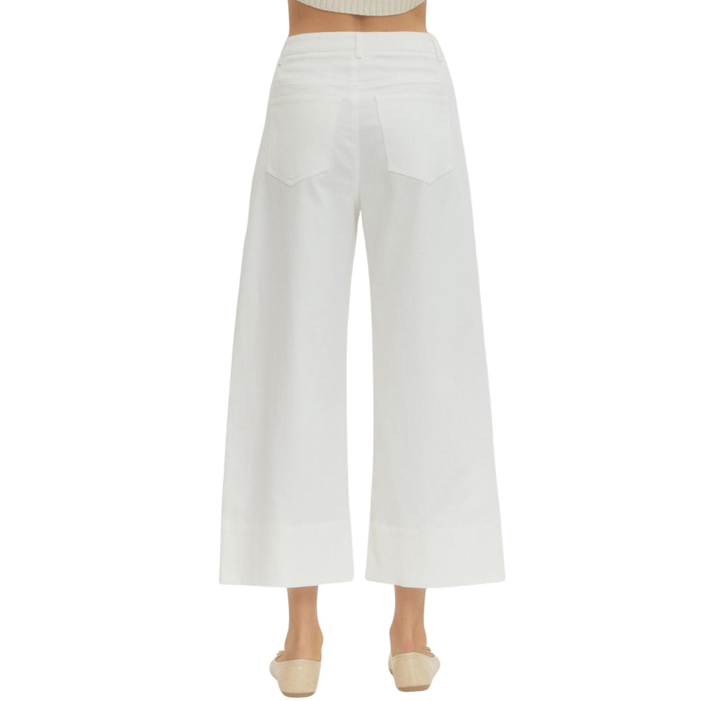 Effortless style meets comfort in these Entro cropped wide leg pants. The off-white hue pairs seamlessly with any top, while the cropped length and relaxed wide-leg silhouette create a modern, flattering look. Perfect for casual outings or dressed-up occasions, these pants offer versatile wear for any season.