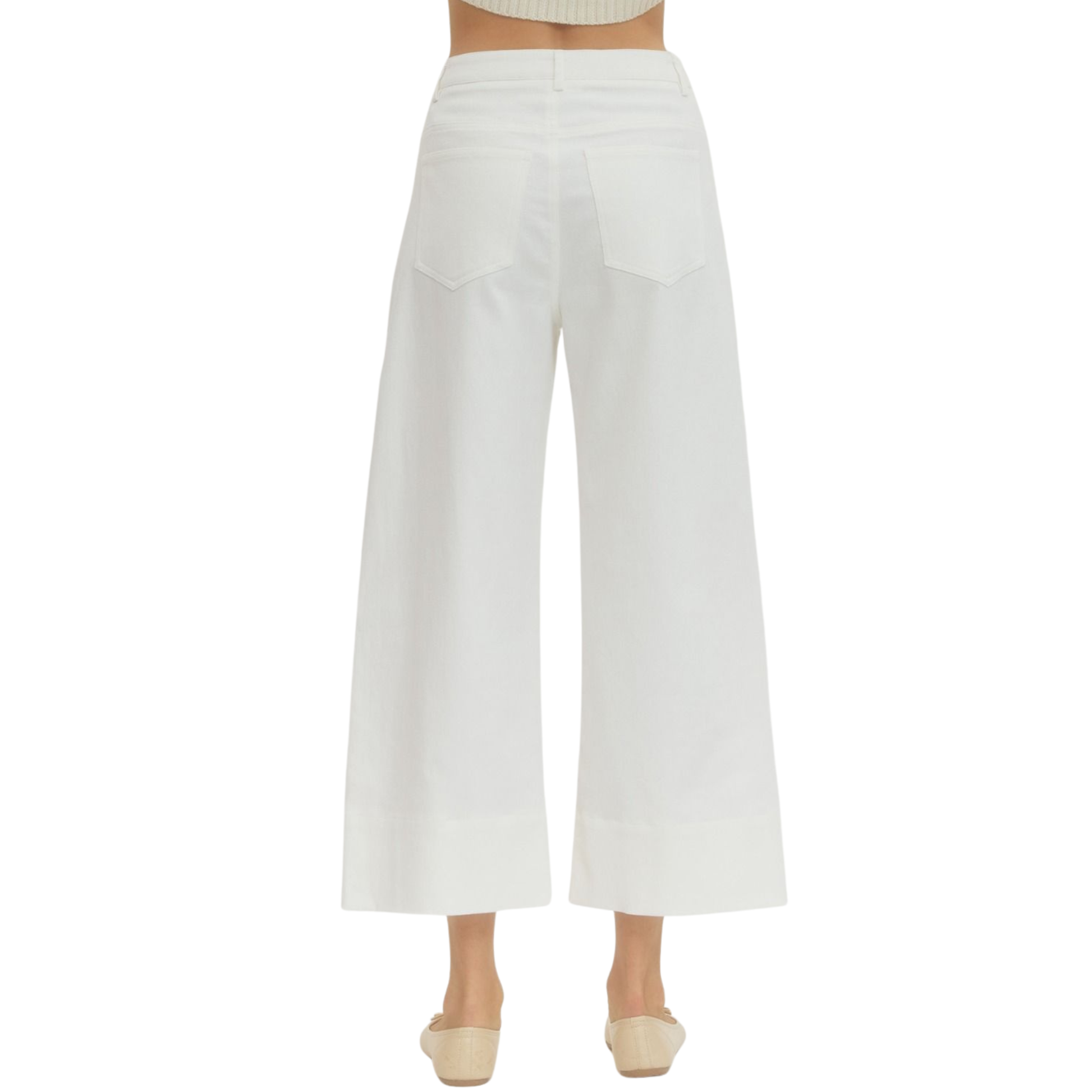 Effortless style meets comfort in these Entro cropped wide leg pants. The off-white hue pairs seamlessly with any top, while the cropped length and relaxed wide-leg silhouette create a modern, flattering look. Perfect for casual outings or dressed-up occasions, these pants offer versatile wear for any season.