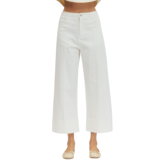 Effortless style meets comfort in these Entro cropped wide leg pants. The off-white hue pairs seamlessly with any top, while the cropped length and relaxed wide-leg silhouette create a modern, flattering look. Perfect for casual outings or dressed-up occasions, these pants offer versatile wear for any season.