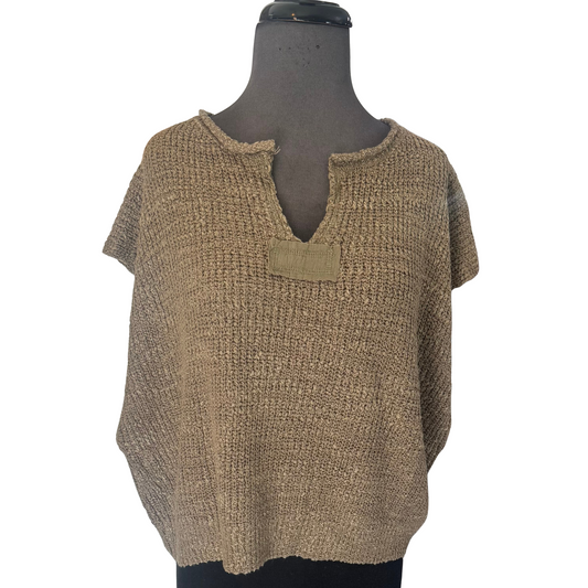 This olive green short sleeve knit sweater combines comfort and style effortlessly. Crafted with a soft, breathable knit fabric, it offers an ideal balance between warmth and ventilation, perfect for layering or standalone wear. Its versatile color complements a wide range of outfits, making it a staple piece for any wardrobe. Designed for an expert finish, this sweater provides a refined, tailored fit that enhances your silhouette while maintaining ease of movement.