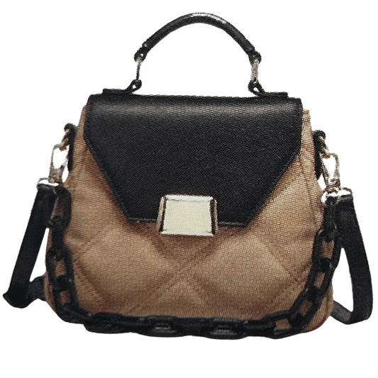 Small two toned quilted crossbody satchel with top handle and metal snap closure. Detachable acrylic chain handle accent. Adjustable/ removable strap.