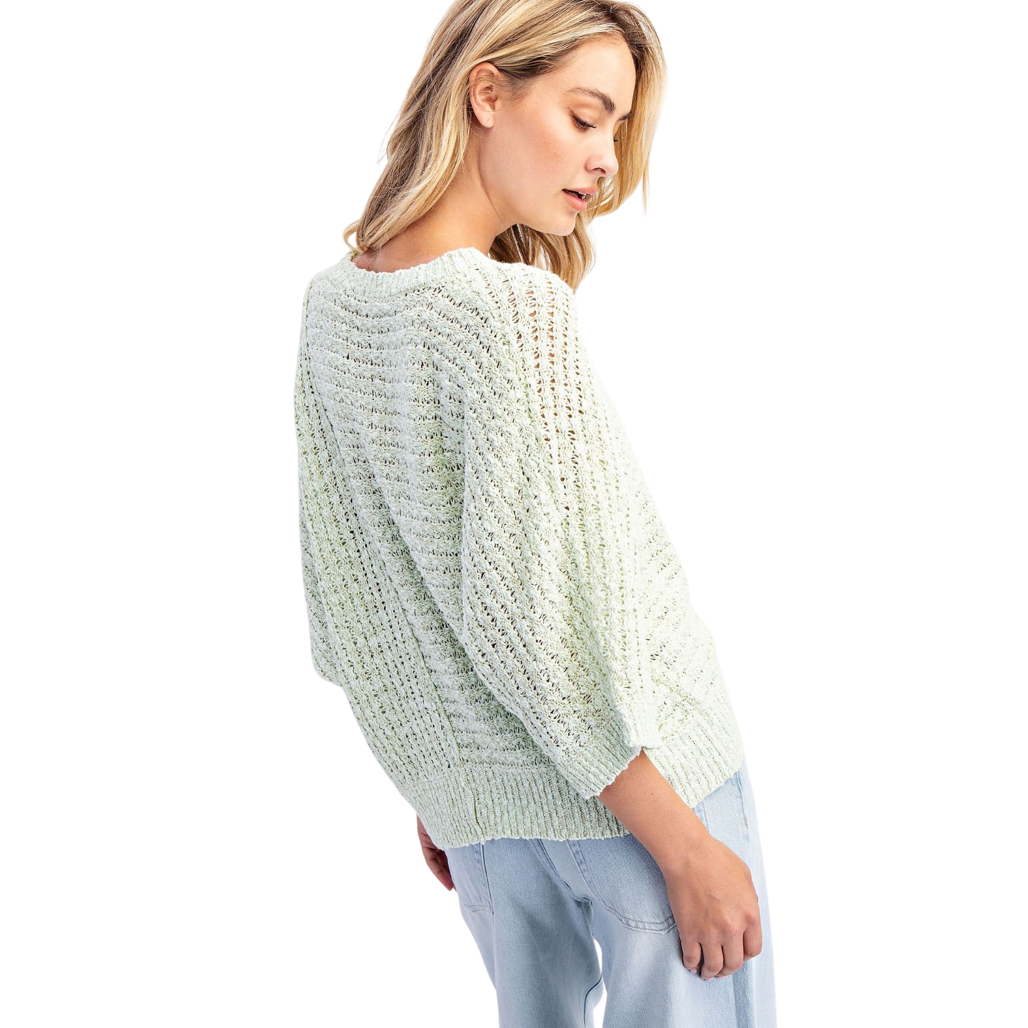 The Open Stitch Sweater from Cotierra combines contemporary design with effortless style. Crafted in a soothing light sage hue, this piece features an eye-catching open stitch pattern that adds texture and visual interest. The asymmetrical cut creates a modern silhouette that flatters various body types while offering a relaxed, sophisticated fit. Perfect for layering or wearing solo, this sweater transitions seamlessly from casual weekends to elevated everyday wear.