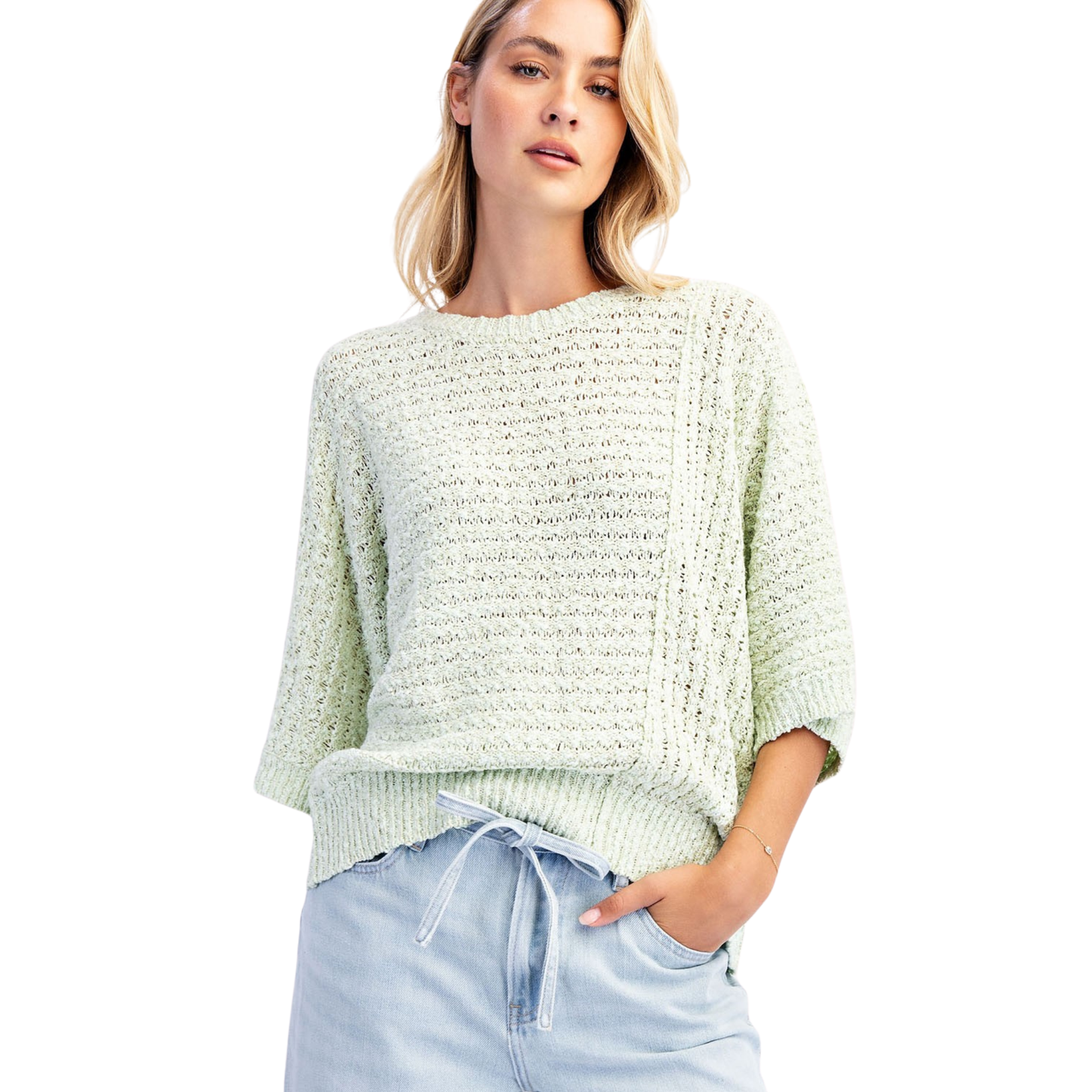 The Open Stitch Sweater from Cotierra combines contemporary design with effortless style. Crafted in a soothing light sage hue, this piece features an eye-catching open stitch pattern that adds texture and visual interest. The asymmetrical cut creates a modern silhouette that flatters various body types while offering a relaxed, sophisticated fit. Perfect for layering or wearing solo, this sweater transitions seamlessly from casual weekends to elevated everyday wear. 