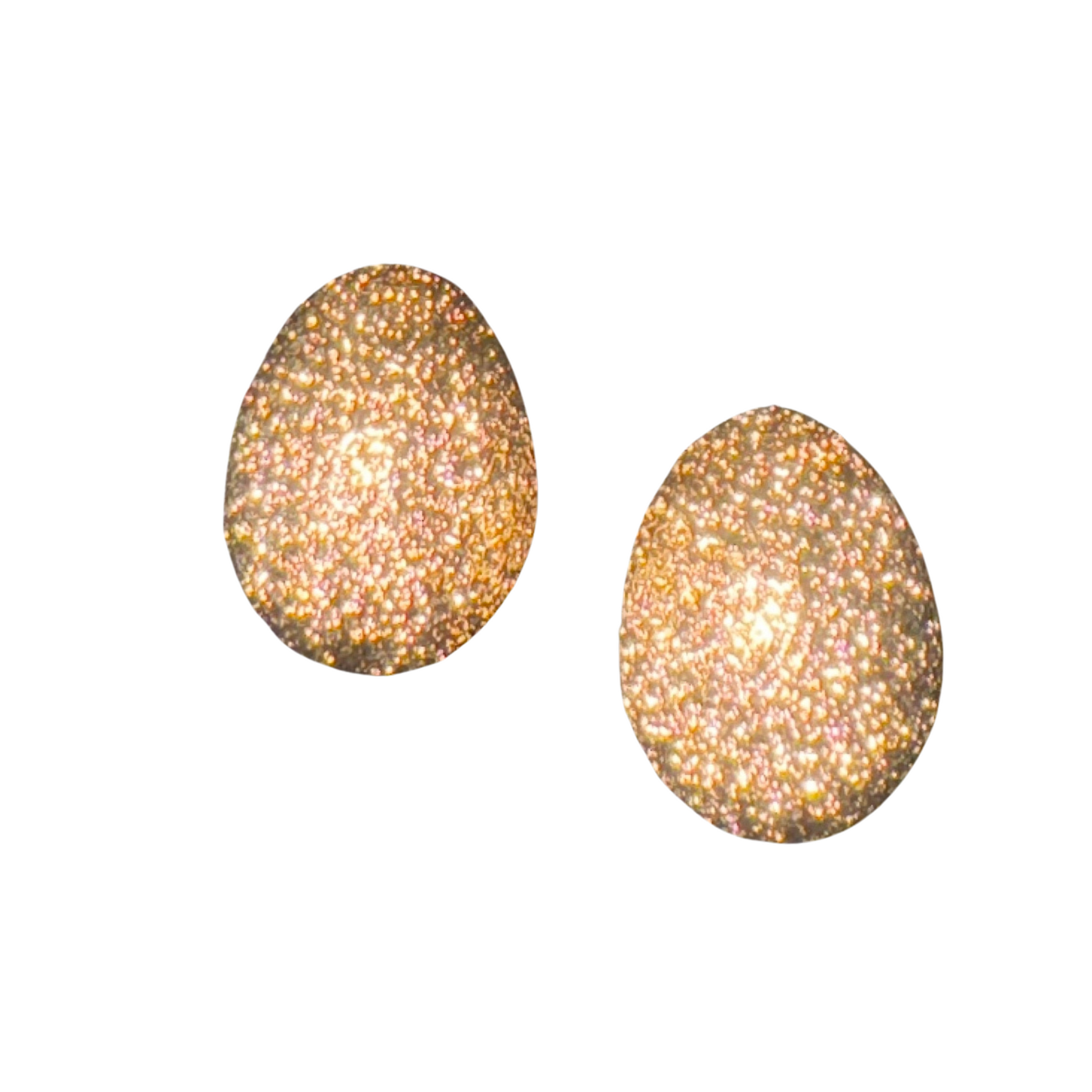 Crafted with 100% pure gold, these oval-shaped stud earrings are the perfect addition to your jewelry collection. The unique egg-shaped design adds an elegant touch to any outfit, while the secure stud closure ensures they stay comfortably in place all day. Upgrade your style with these timeless earrings.