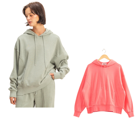 This oversized hoodie from Double Zero offers cozy, relaxed fit perfect for layering or casual wear. Available in soothing sage green and playful taffy pink, it combines comfort with subtle style. Crafted for durability and softness, it’s an essential addition to any wardrobe seeking both warmth and effortless fashion.
