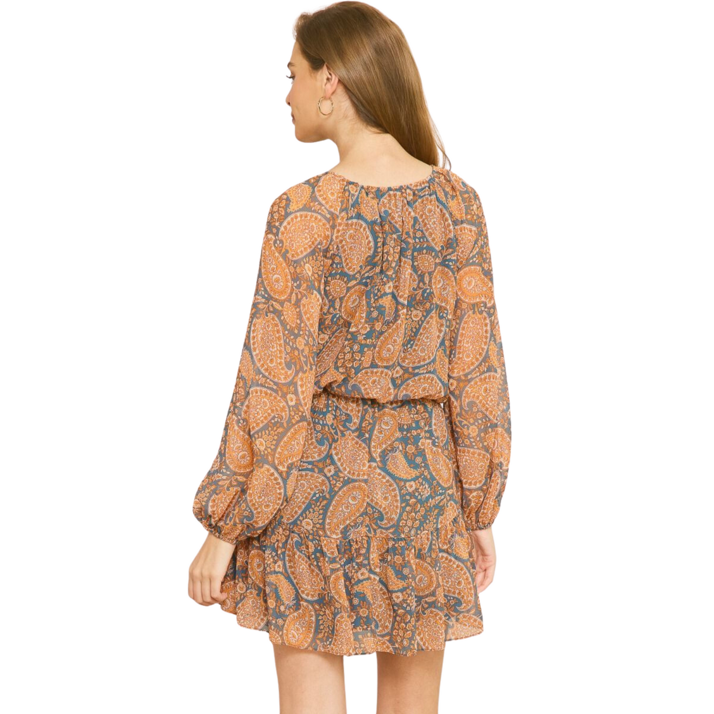 Stand out with style in this Long Sleeve Paisley Print Mini Dress. It features a unique paisley print, boat neckline, long sleeves with elastic cuffs, and front buttons. The self-tie at the waist and lightweight woven fabric provide a flattering fit. This dress is fully lined for added comfort.