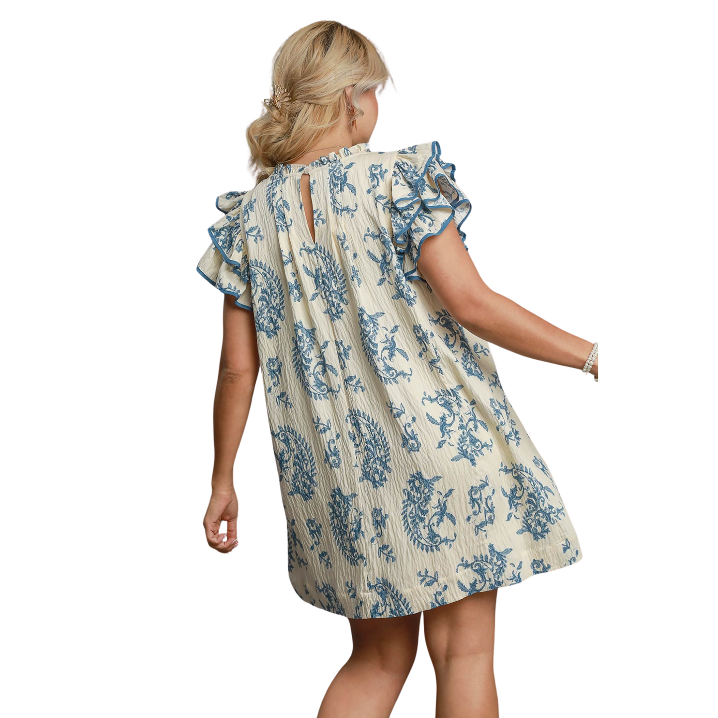 This mini dress from Umgee features a beautiful blue mix paisley print that is sure to turn heads. The tiered design adds a touch of playfulness, while the short sleeves offer comfort and style. Perfect for any occasion, this dress will make a statement with its unique pattern and high quality Umgee brand.