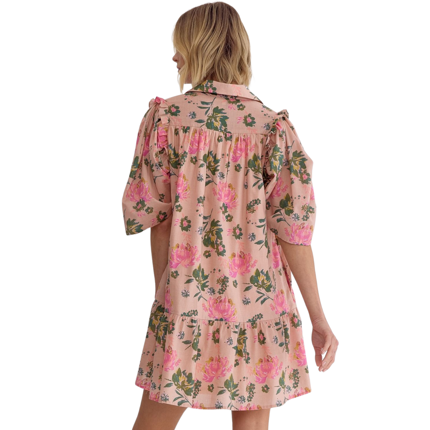 Introducing our Floral Button Up Mini Dress. This peach-colored woven dress features a floral pattern and a collared neckline. The half sleeves have ruffled trimming for an added touch. Stay comfortable with pockets at the side and a lightweight, lined design. Perfect for any occasion.