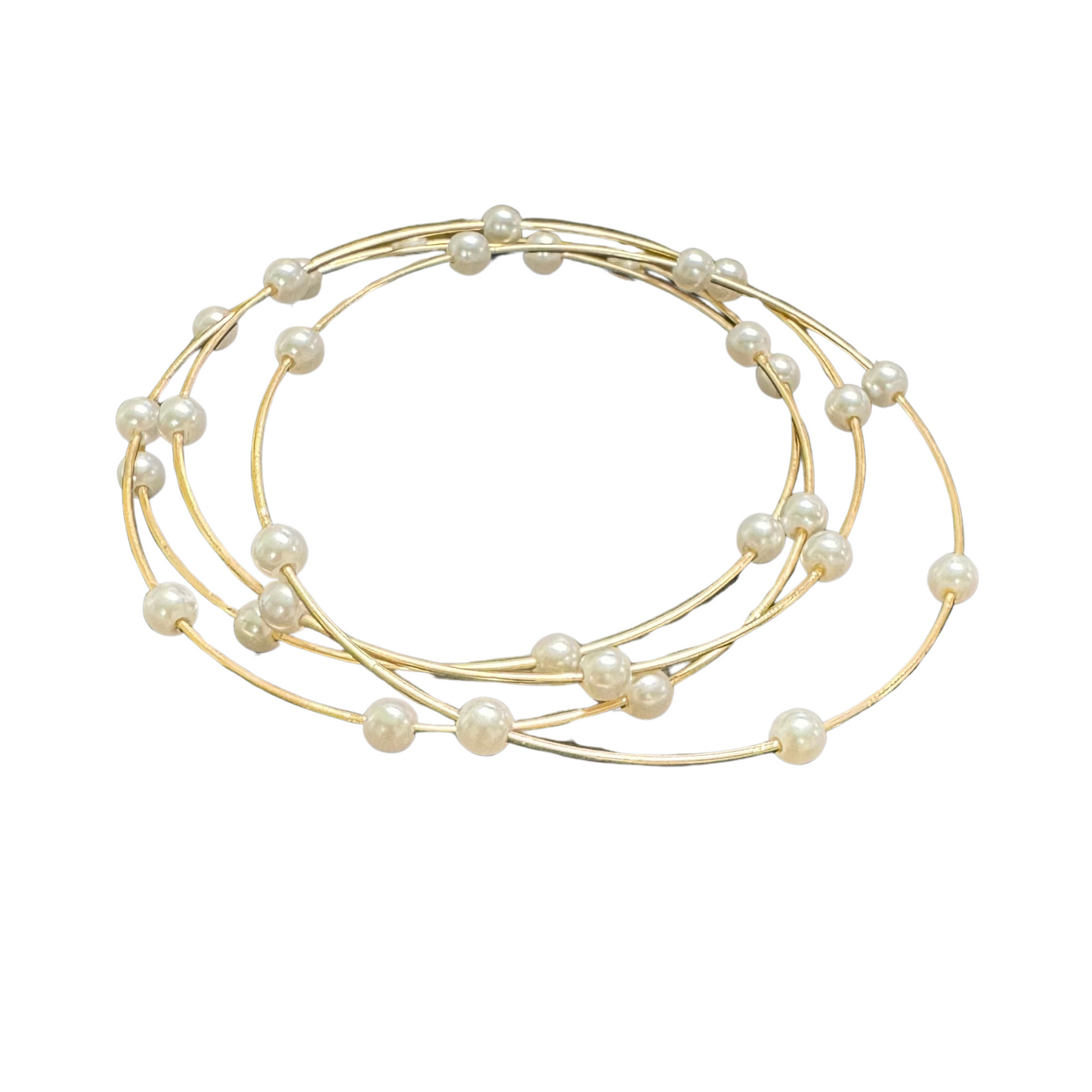 Crafted with elegance in mind, this Pearl Bangle Set features a luxurious gold finish and beautiful pearl accents. Elevate any outfit with this versatile bangle bracelet set. The perfect addition to any jewelry collection.