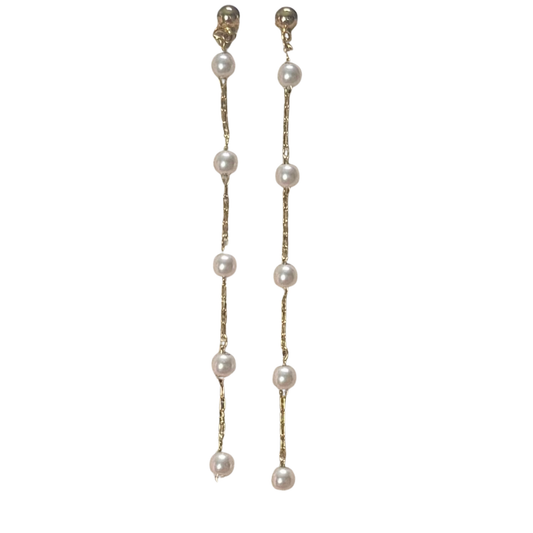 Elevate your everyday elegance with these stunning Pearl Drop Earrings from Perdido Gems. Crafted with lustrous pearls and delicate gold accents, these dangle earrings catch the light beautifully and move gracefully with you. The timeless pearl design pairs effortlessly with any outfit, while the gold detailing adds a touch of sophisticated luxury. Perfect for special occasions or refined daily wear, these earrings bring understated glamour to your jewelry collection.