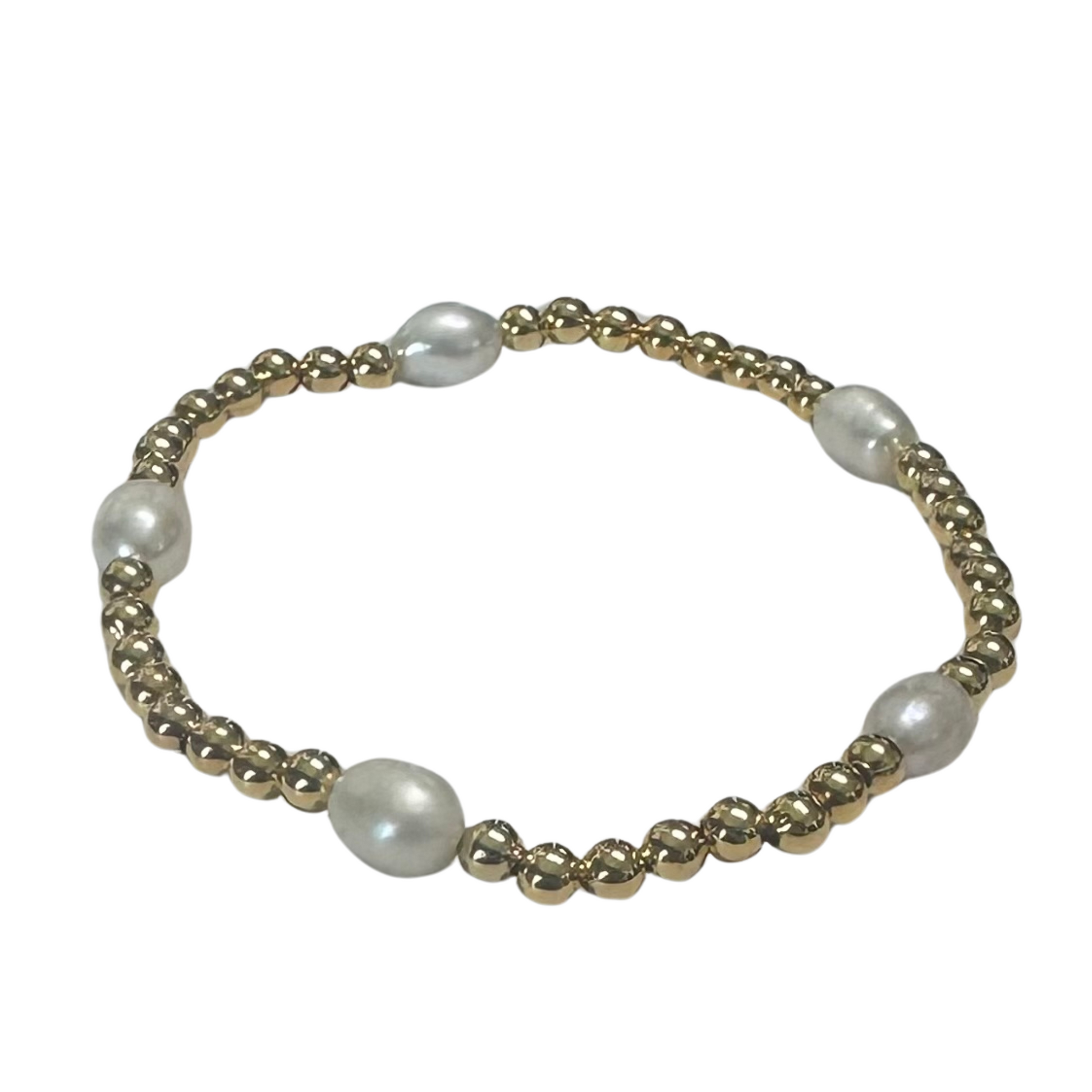 Large pearl stretchy bracelet with small gold beads