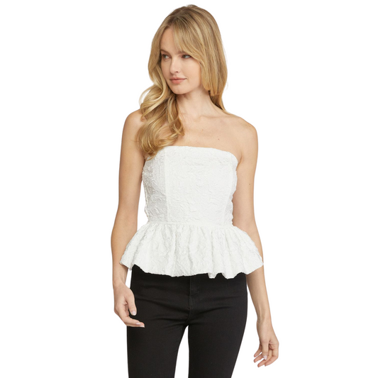 Expertly crafted from a floral jacquard fabric, this peplum top features a smocked back for a flattering fit. The non-sheer and lightweight design provides comfort while the off-white color adds a touch of sophistication. Perfect for any occasion, this top is a must-have in your wardrobe.