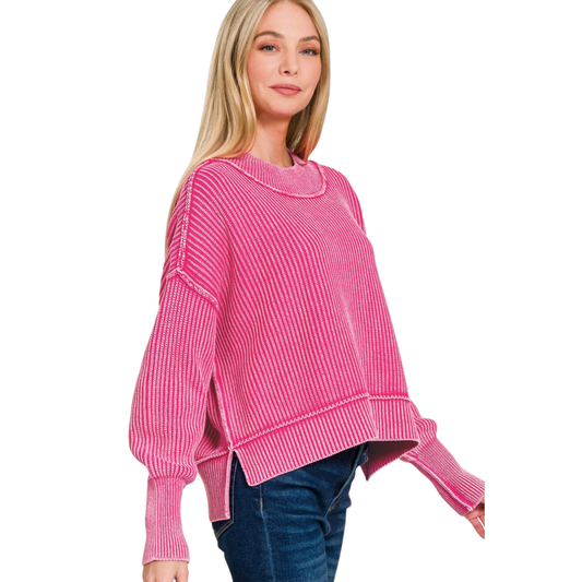 Elevate your layering game with this hot pink ribbed cropped sweater from Zenana. The long sleeves and fitted ribbed texture create a flattering silhouette that pairs effortlessly with high-waisted bottoms. Washed for a soft, lived-in feel, this piece delivers contemporary style with versatile appeal. Perfect for transitional seasons or as a statement layer under oversized outerwear.