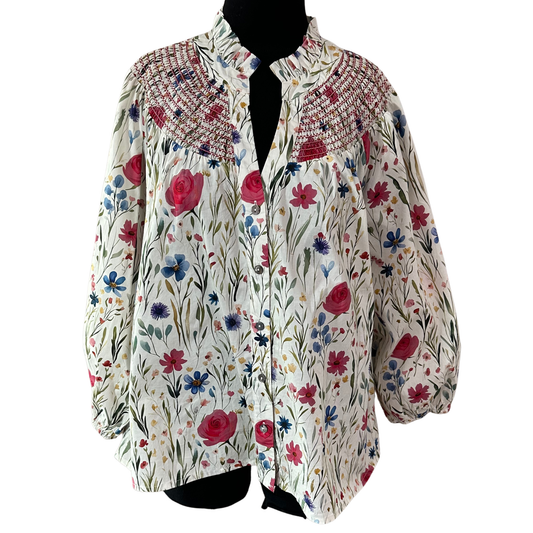 Elevate your wardrobe with this charming Floral Print V-Neck Top by Entro. Featuring a delicate pink floral design, this piece combines feminine style with comfortable sophistication. The flattering v-neckline draws attention upward, while intricate smocking detail at the bodice adds texture and visual interest. Three-quarter length sleeves offer the perfect balance between coverage and breathability, making it ideal for layering or wearing solo.
