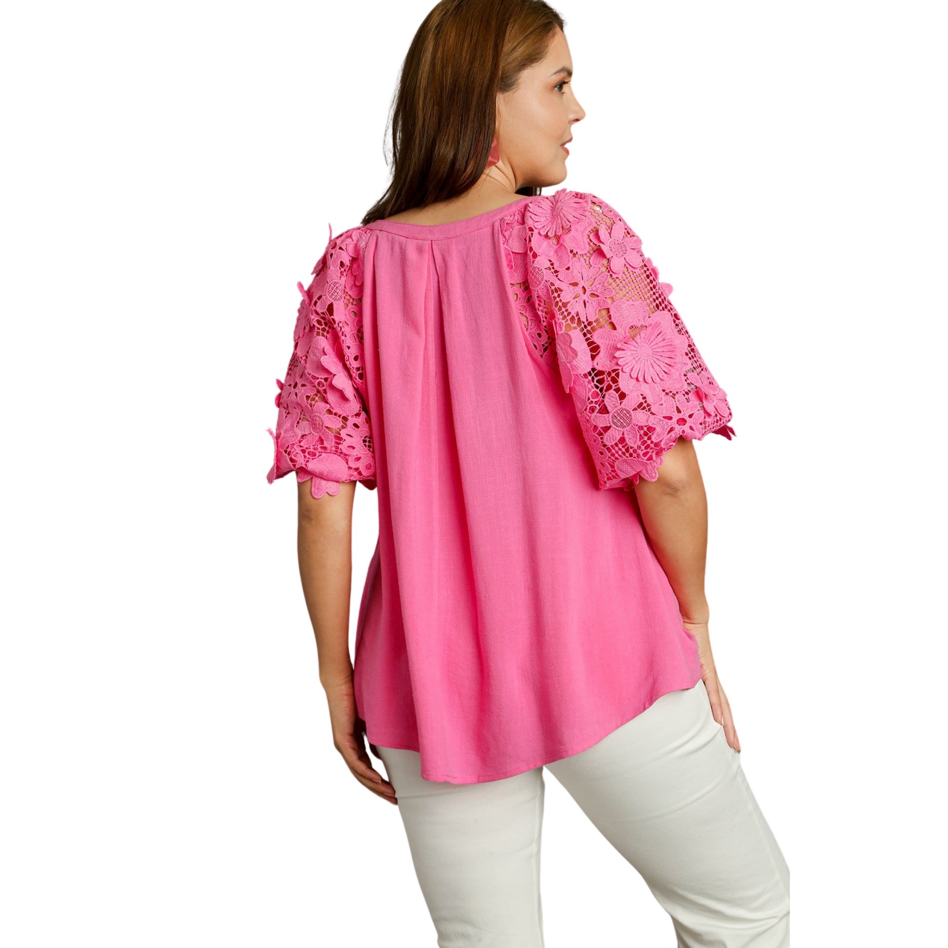 This Boxy Cut Top is a must-have for any fashion-forward plus size woman. The bubble sleeves and 3D flower print add a unique and trendy touch, while the bright pink color makes a bold statement. With a comfortable and flattering fit, this top is the perfect addition to your wardrobe.