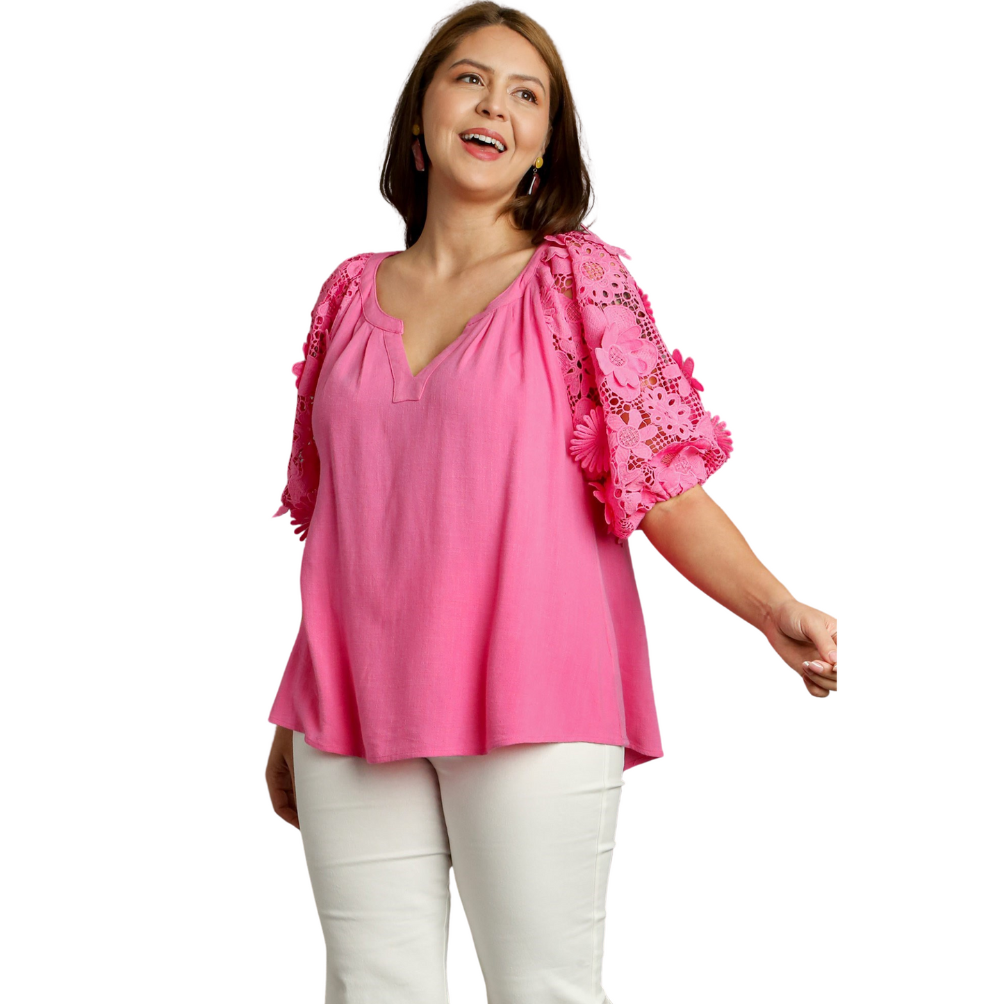 This Boxy Cut Top is a must-have for any fashion-forward plus size woman. The bubble sleeves and 3D flower print add a unique and trendy touch, while the bright pink color makes a bold statement. With a comfortable and flattering fit, this top is the perfect addition to your wardrobe.