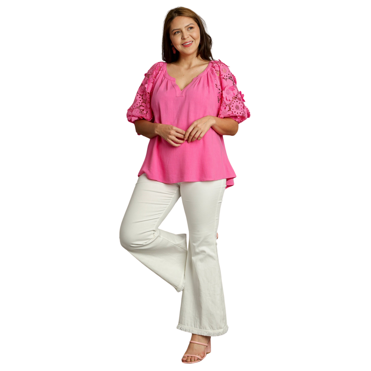 This Boxy Cut Top is a must-have for any fashion-forward plus size woman. The bubble sleeves and 3D flower print add a unique and trendy touch, while the bright pink color makes a bold statement. With a comfortable and flattering fit, this top is the perfect addition to your wardrobe.