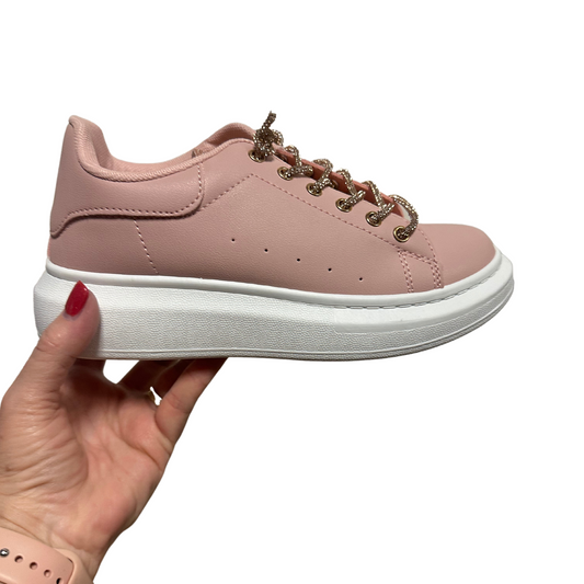 These Pink Glitter Sneakers will add a spark of chic style to your wardrobe. Crafted from a pink fabric and featuring rose gold glitter laces, these sneakers are perfect for making a memorable fashion statement.