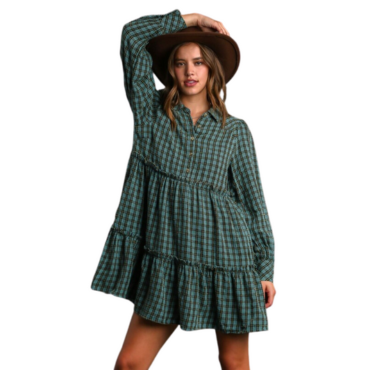 Introducing a timeless piece perfect for chilly days. The Tiered Mini Dress features long sleeves, intricate plaid pattern, delicate ruffe tiers, and two side pockets. All of this stitched in a gorgeous teal fabric to give you a fashionable and functional look.