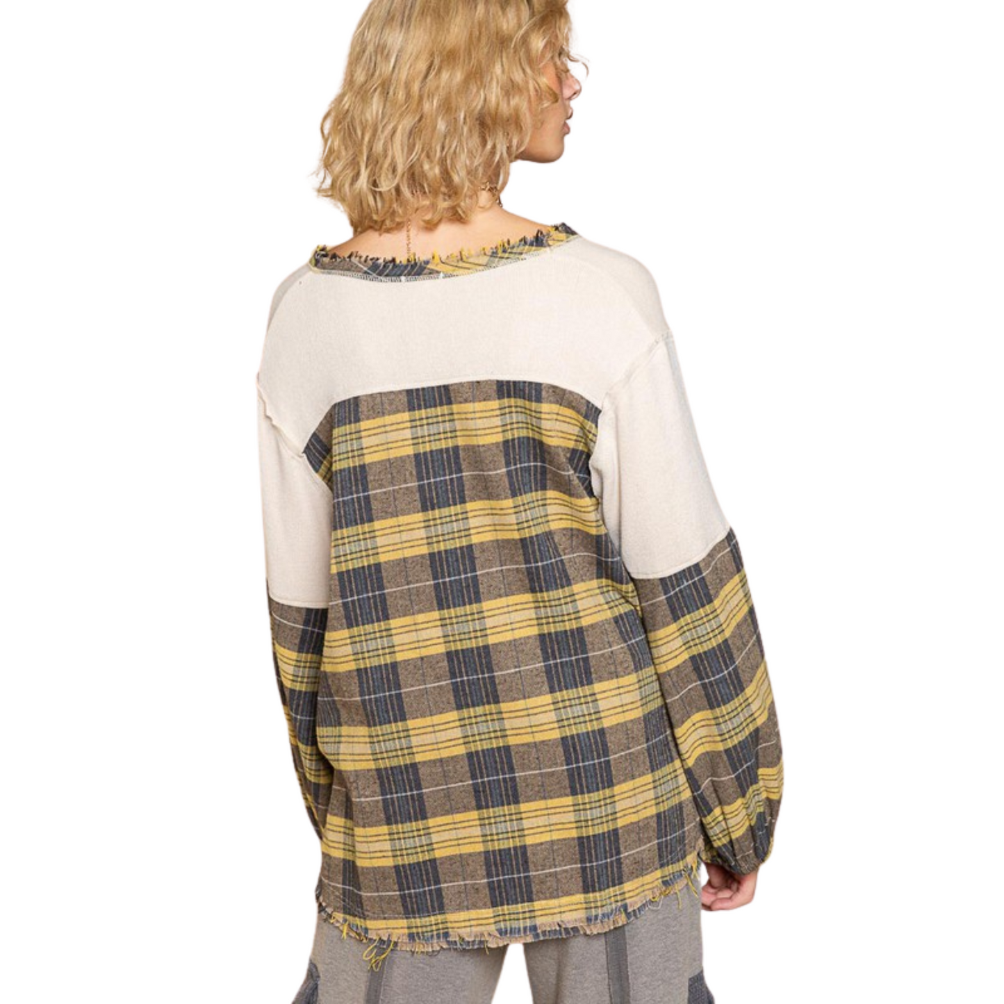 This Plaid Sleeve Pocket Top features a classic blue and yellow plaid on the sleeves and a creamy ivory color on the body. It's made of breathable fabric, ensuring a comfortable fit that's perfect for everyday wear. The pocket adds an extra touch of style that makes this top great for both casual and dressy occasions.