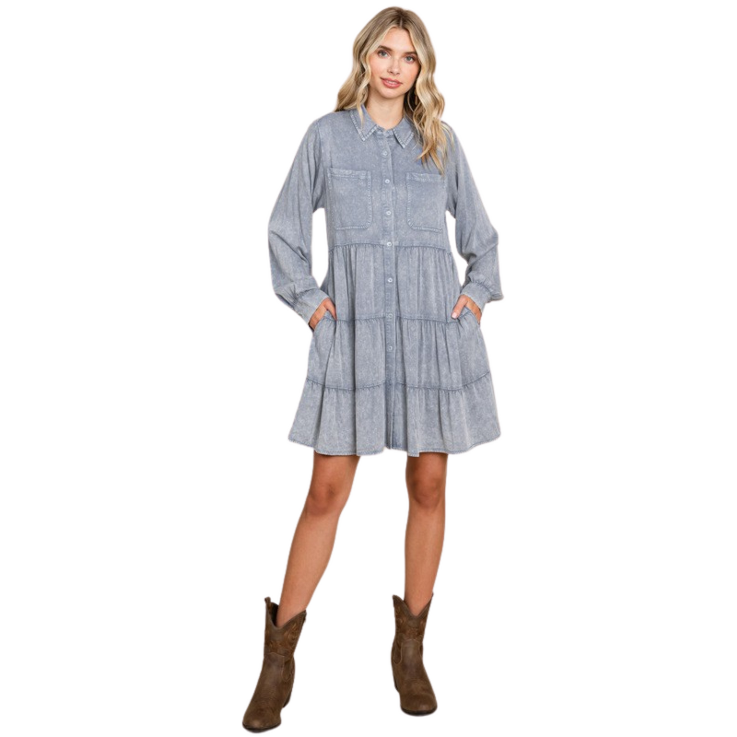 Introducing the Washed Babydoll Dress With Pockets. This dress is crafted from washed material for a unique look. Features include a collared neck, chest pockets, long shirt sleeves, and tiered layers with wrinkle detail. Plus size available in Denim color. Unlined, non-sheer, and lightweight for an exceptionally comfortable fit.